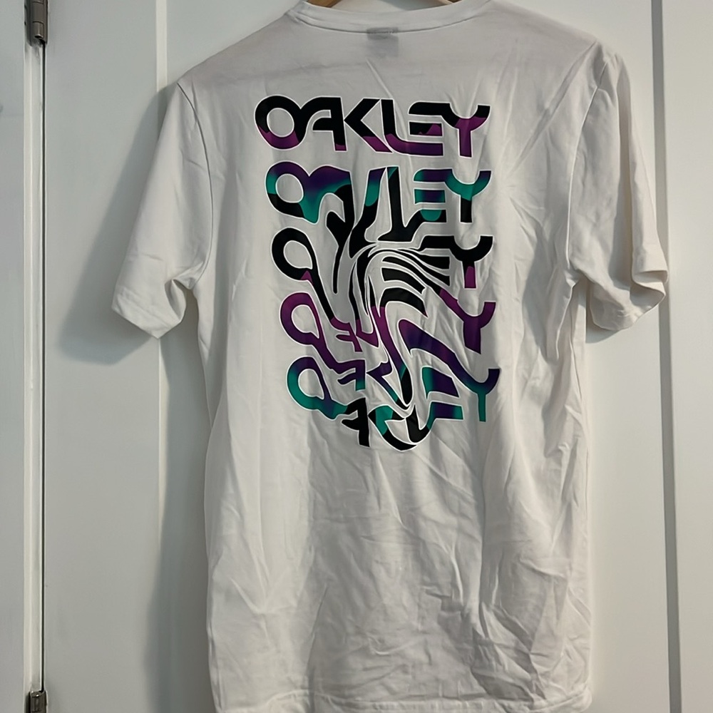 Oakley white t- shirt w/oakley design on back